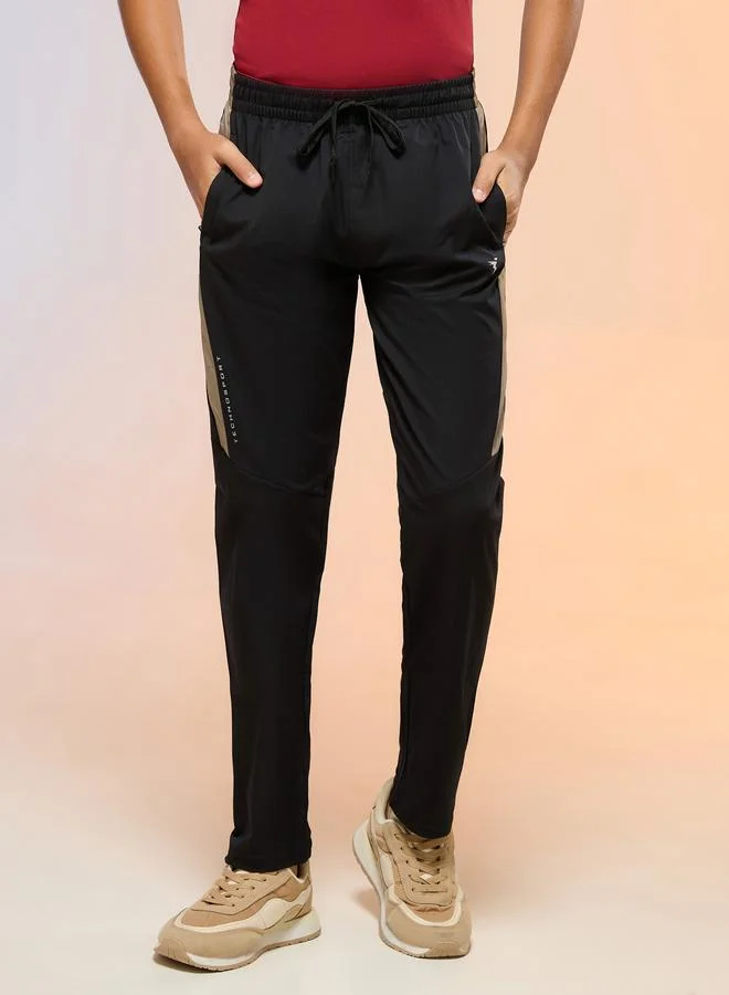 تكنوسبورت بنطال رياضي للأولاد بقصة ضيقة